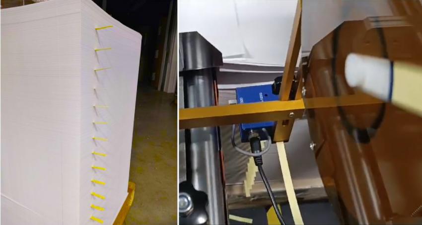 Укладка листов 65 грам в приемку листорезальной машины STERLING S140 в ходе тестирования